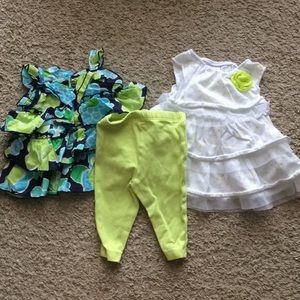 2 Carter's infant shirts with matching pants.
